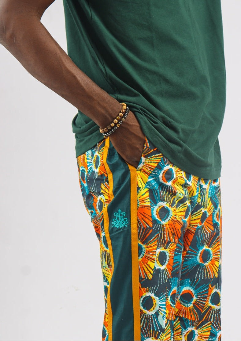 Yellow sun ray print pants with contrast strip